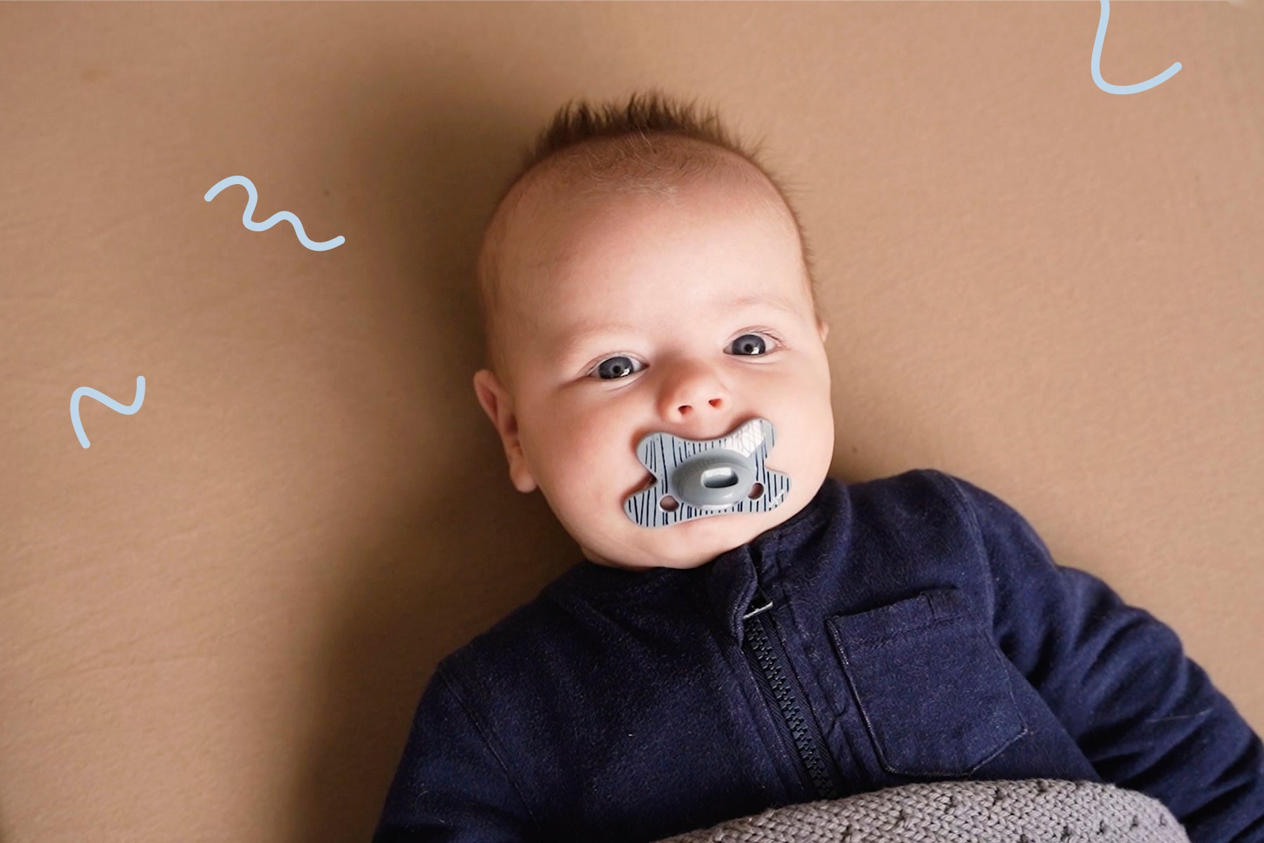 Baby met speen