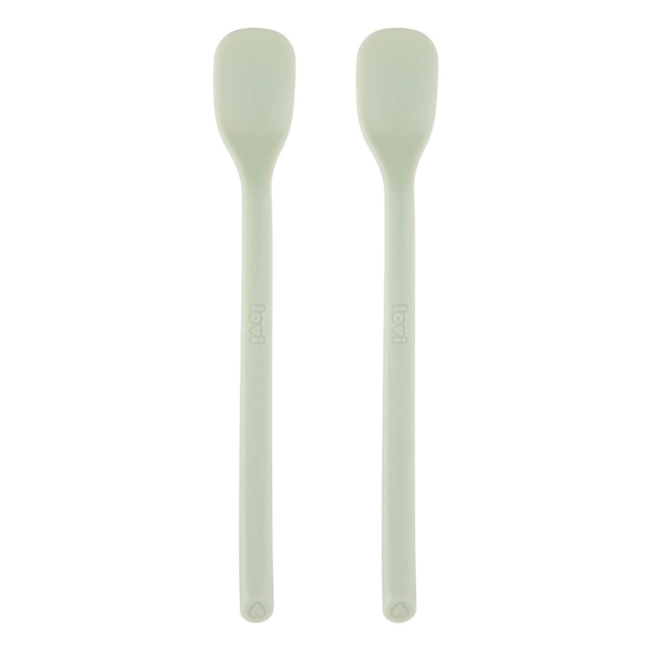 Twee eerste voedingslepels voor baby’s in pistachekleur, voorkant
